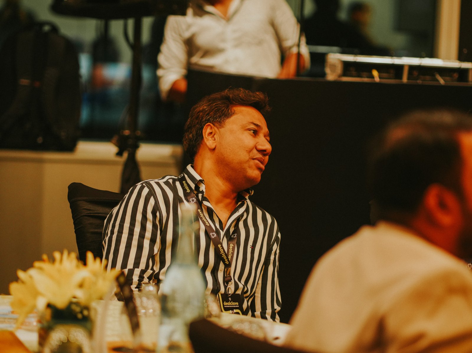 Guest at a Dealclave dinner table